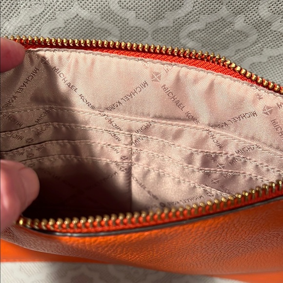 Michael Kors Orange Clutch with Intricate Embossed Design - Picture 11 of 11
